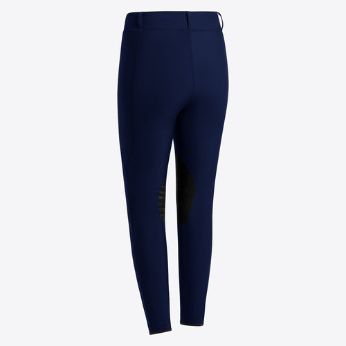 Die Cavalleria Toscana Women's Jumping Knee Grip Leggings in Navy, gezeigt auf einem weißen Hintergrund. Die Leggings sind aus einem technischen Jersey gefertigt, das antibakteriell und schnelltrocknend ist. Die seitliche Tasche mit dem Cavalleria Toscana Logo ergänzt das moderne, sportliche Design, das sowohl für das Reiten als auch für den Alltag geeignet ist.