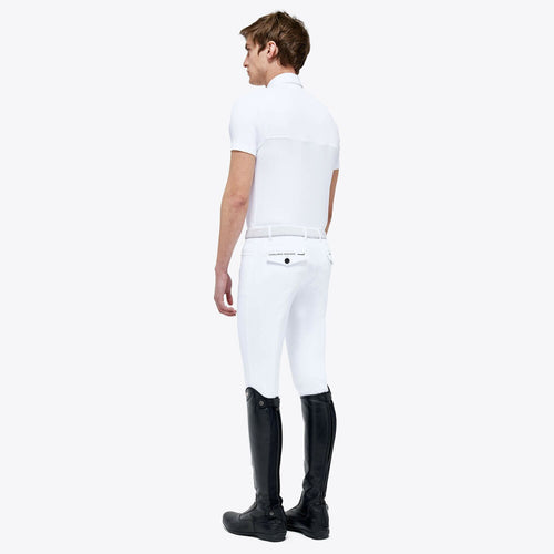 Show shirt in technical piqué knit fabric with embroidered logo and short sleeves.